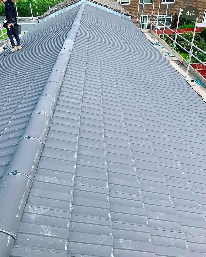 Professional roofer installing a slate roof in Southampton